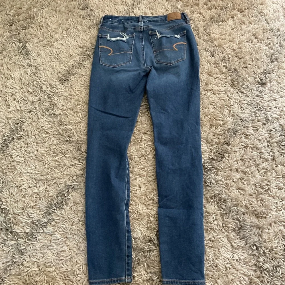 American Eagle Next Level Stretch Distressed Skinny Jeans Blue Size 0 Regular